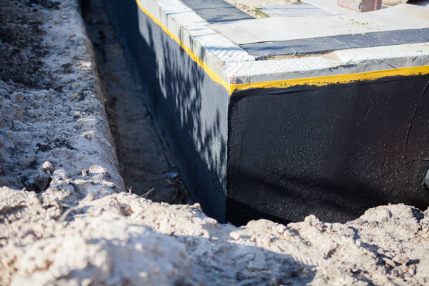 Professional Basement Waterproofing technician working in Little Ferry, NJ
